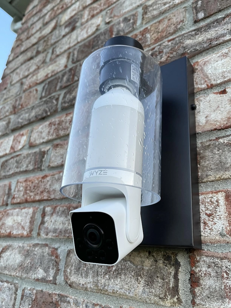 Wyze Bulb Cam: 2026 Ultimate Guide For Best Smart Security 2 Wyze Bulb Cam close-up view showing WYZE branding and 2K HD camera lens mounted on brick wall